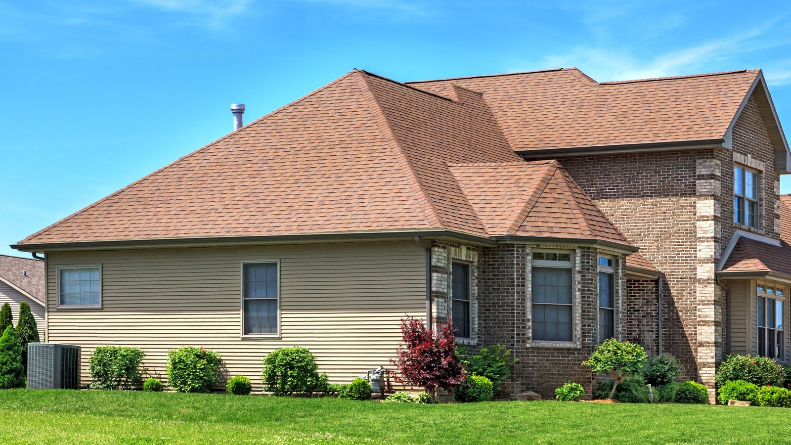 Suburban home with a new shingle roof